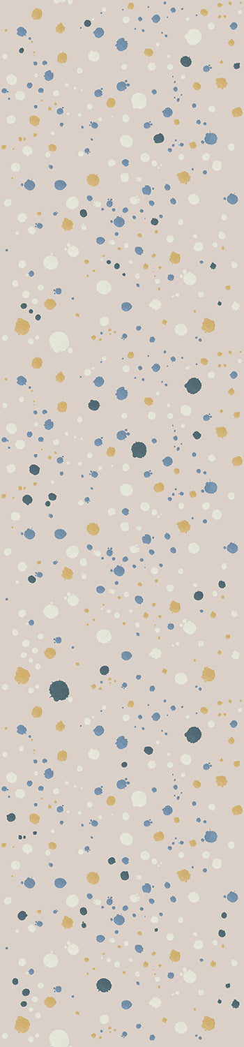 A roll of wallpaper with a beige background and a pattern of multicolored dots from drop it MODERN.