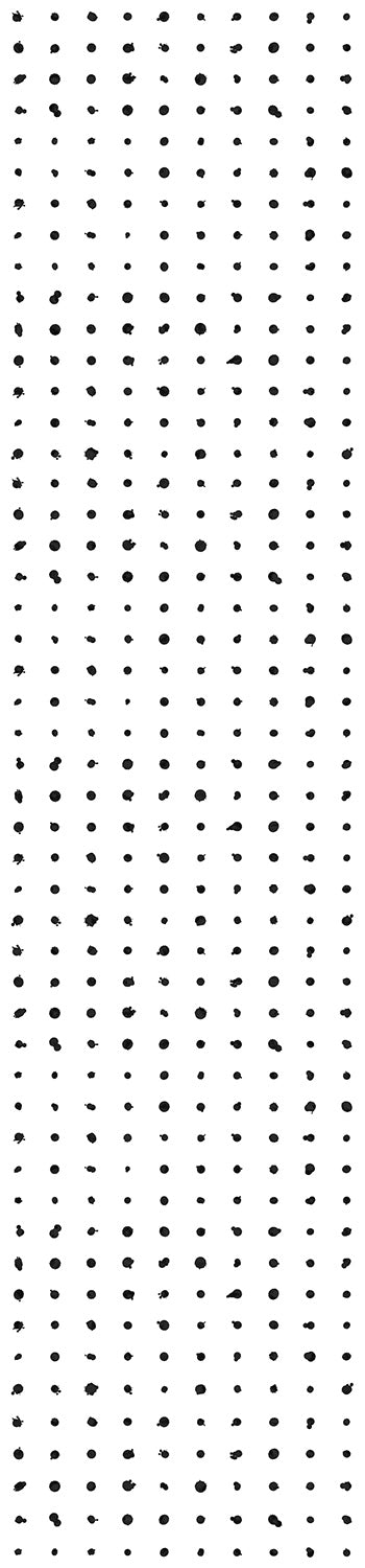 A roll of dotted line wallpaper with a black and white pattern consisting of irregular dots from drop it MODERN.