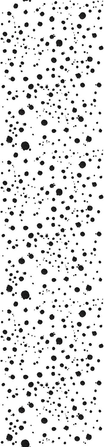 A roll of wallpaper featuring a black ink drop pattern on a white background from drop it MODERN.