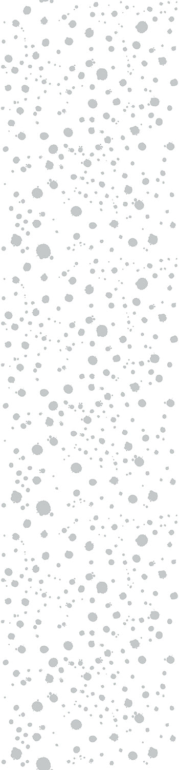 A roll of untrimmed grey and white dotted wallpaper from drop it MODERN.