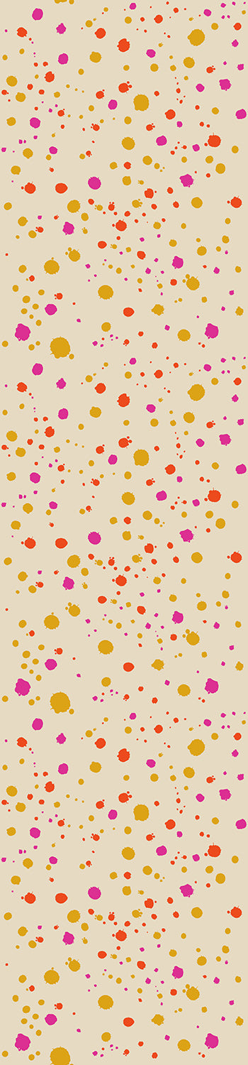 A roll of wallpaper featuring a starburst pattern with a colorful dot design on a beige background from drop it MODERN.