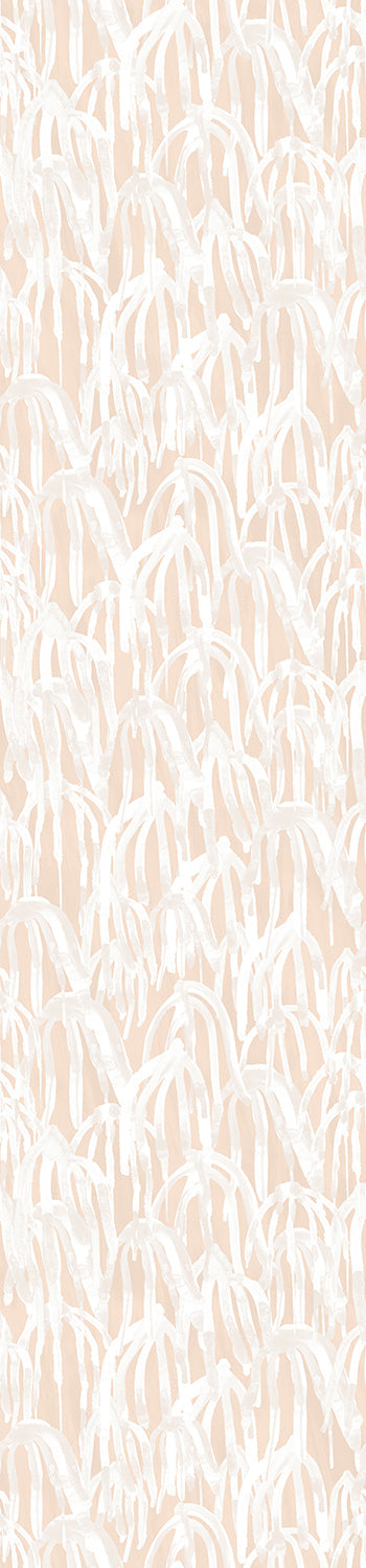 A roll of wallpaper featuring a botanical pattern with peach-colored leaves on a white background from drop it MODERN